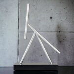 Elegant glass straw sculpture with geometric design, perfect for science-themed decor and educational displays. Crafted from clear glass, it showcases scientific artistry and innovative design.