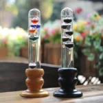 Colorful Newton's Cradle with Pendulum Balls for Science Experiments.