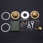 Complete engine disassembly kit with metal gears, plates, screws, and tools for science education and mechanical projects.
