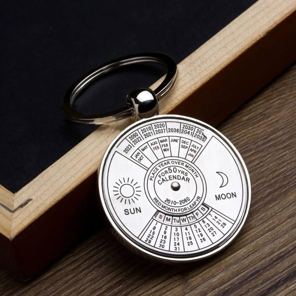 Weather Calendar Keychain Innovative weather calendar keychain displaying moon and sun symbols with detailed month and year indicators, perfect for educational purposes and weather tracking.