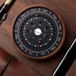 Unique planetary calendar clock for science enthusiasts.