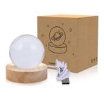 Brighten your room with this glow moon night light, featuring a celestial planet design on a wooden base, perfect for space-themed decor and educational purposes.