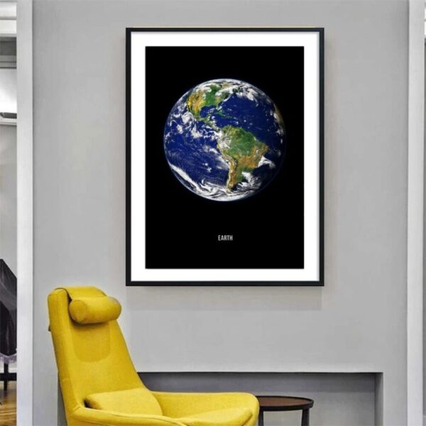 Framed poster of Earth globe showing continents and oceans on a black background, perfect for science-themed decor in home or office settings.