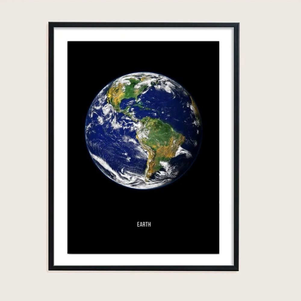 Framed poster of Earth showing continents and oceans, ideal for science decor and educational spaces. Perfect for science enthusiasts and classroom decoration.