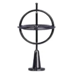 A vintage-style black armillary sphere model for science decor and educational purposes.