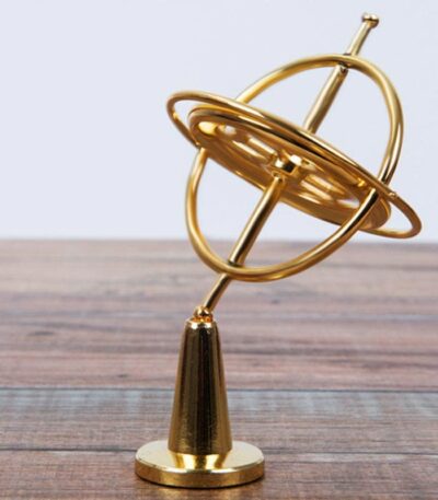 Armillary sphere model representing celestial objects, used as a decorative piece and educational tool for astronomy enthusiasts.