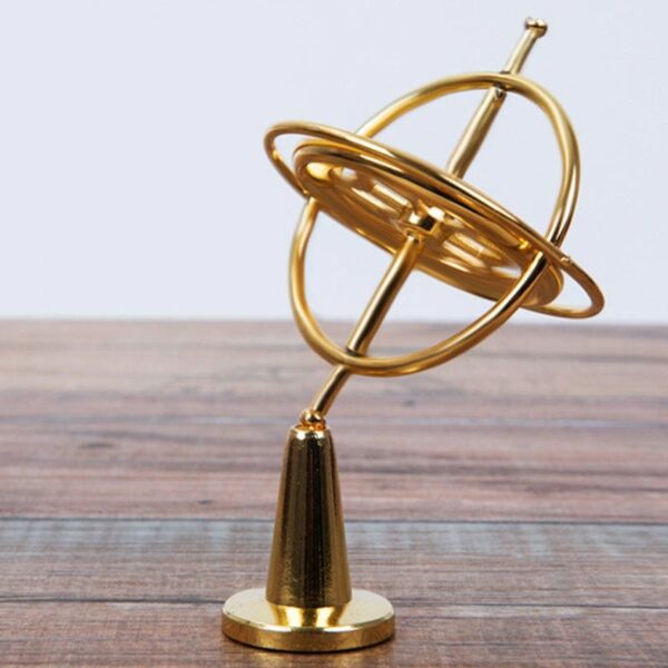 Armillary sphere model representing celestial objects, used as a decorative piece and educational tool for astronomy enthusiasts.