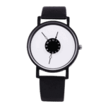 Modern minimalist wristwatch featuring a distinctive dial with a central rotating disc displaying hours and minutes, set against a plain background.