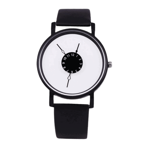 Modern minimalist wristwatch featuring a distinctive dial with a central rotating disc displaying hours and minutes, set against a plain background.