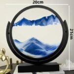 A circular wall art piece featuring a serene mountain landscape with blue and white tones, measuring 20cm in diameter and 21cm in height, perfect for science-themed decor.