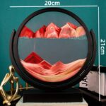 A mesmerizing 3D mountain landscape wall art with vibrant red, pink, and beige hues, encased in a circular frame measuring 20cm by 21cm, perfect for modern interior decoration.