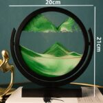 Interactive water cycle model with a circular glass display showing evaporation, condensation, and precipitation stages.