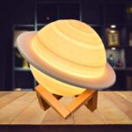 Saturn planet lamp with realistic rings, perfect for science-themed decor and educational spaces.