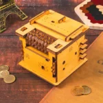 A detailed image of a vintage mechanical puzzle box made of wood, featuring intricate gears and mechanisms, placed on a wooden surface with coins nearby.