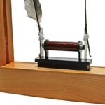 Small electromagnetic experiment kit with a copper coil, iron core, and feather, demonstrating magnetic fields and electromagnetic principles.