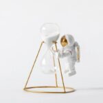 Astronaut and Hourglass Science Decor.