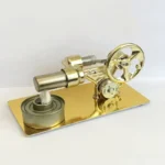 Detailed miniature steam engine with gold and silver finish, designed for science education and demonstrations. Perfect for teaching principles of thermodynamics and mechanical motion.