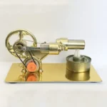 Gold-colored steam engine model for educational display and decoration.