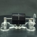 Clear acrylic solar panel science model demonstrating photovoltaic energy conversion for educational purposes.