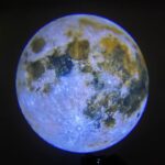 Detailed model of the moon's surface showcasing craters, lunar features, and textured terrain for educational and decorative purposes.