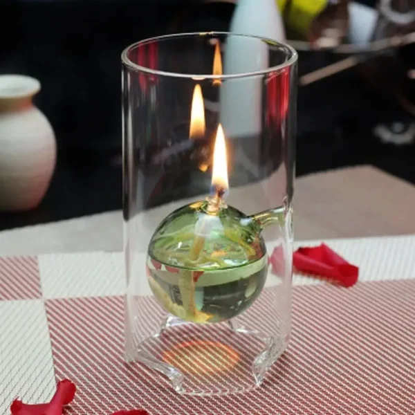 Glass container with a floating candle and liquid, demonstrating scientific principles of combustion and buoyancy.