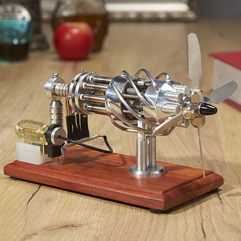 Detailed miniature rocket engine model made of metal with a wooden base, showcasing intricate components and a small propeller, perfect for science decor and educational displays.