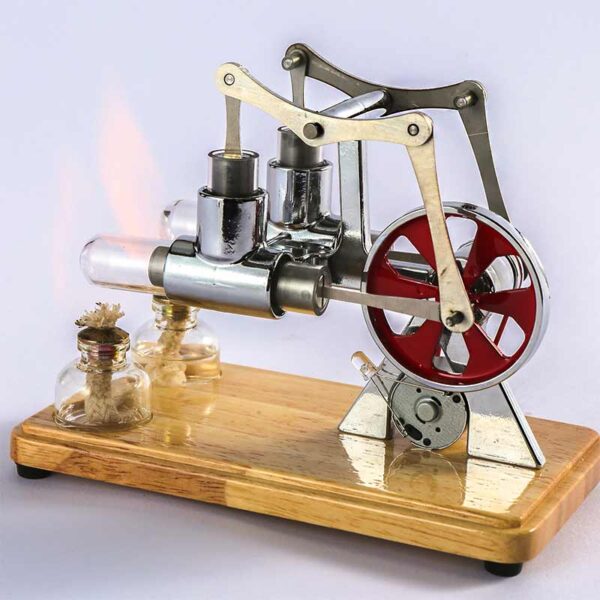 A detailed miniature steam engine model with metal components, red flywheel, and wooden base, demonstrating basic principles of steam power and mechanics.