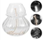 Clear glass vase with a candle wick inside, used for science demonstrations and experiments.