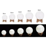 Illuminated Moon Phases Model with Wooden Stand.