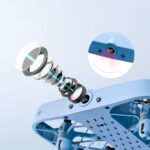 Close-up of a modern microscope camera with lens components, designed for scientific observation and educational purposes.