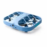 Small blue quadcopter drone with protective frame, ideal for beginners and educational purposes, featuring four propellers and a compact design.