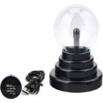 A Tesla coil generator with a clear glass sphere, black base, and power cable, used for science demonstrations and educational purposes.