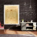 Detailed image of Leonardo da Vinci's Vitruvian Man sketch, showcasing human proportions and anatomy, displayed on a wall in a modern interior setting.