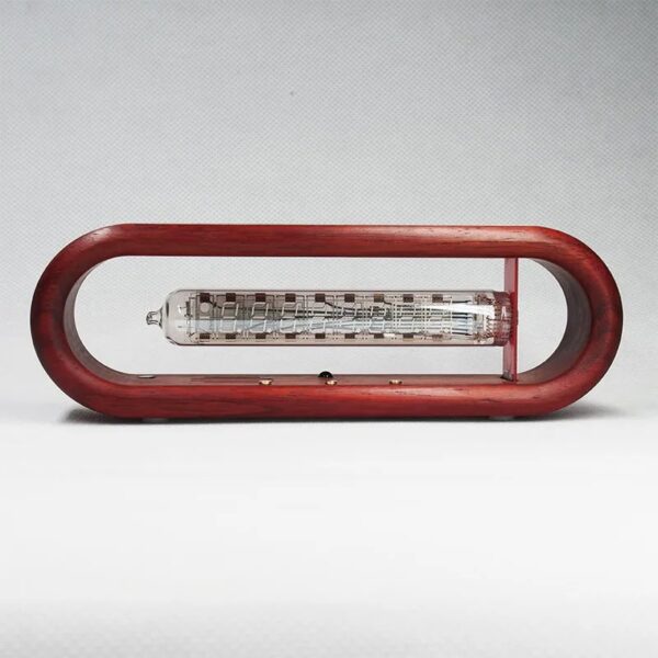 Vintage glass thermometer encased in a red wooden frame, showcasing a classic scientific instrument for temperature measurement.