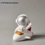 Astronaut Figurine on Rocket Model for Kids and Collectors.