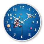 A space-themed wall clock featuring an astronaut and planets, perfect for science enthusiasts and educational decor.