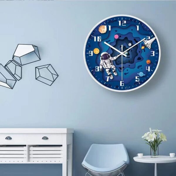 Colorful space-themed wall clock with astronaut and planets design, perfect for children's rooms or educational spaces.