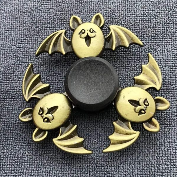 Bat-shaped fidget spinner with a whimsical design, featuring metallic gold finish and bat wings, ideal for stress relief, sensory play, and educational activities.