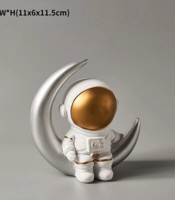 Cute astronaut figurine with a golden helmet, standing on a silver crescent moon. Perfect for science-themed decor and educational purposes.