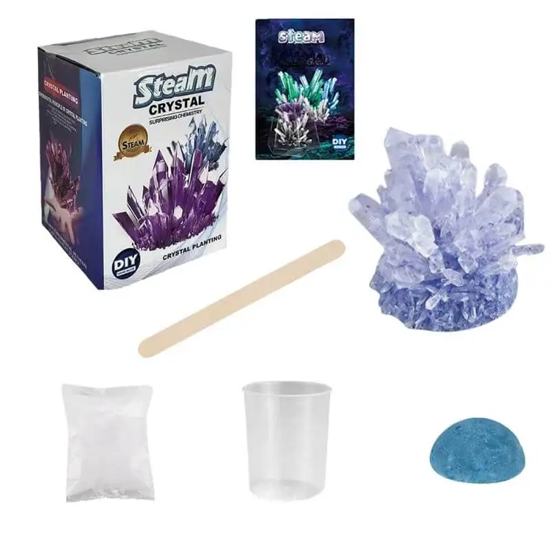 Complete crystal growing science kit with colorful crystals, growth container, stirring stick, and detailed instructions for educational and decorative purposes.