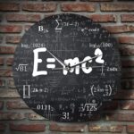Modern wall clock featuring a black background with white mathematical formulas and symbols, perfect for science enthusiasts and educational decor.