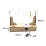 Educational magnetic oscillator experiment with wooden base, wires, and magnet for science learning.