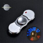 Silver fidget spinner with LED light display, designed for stress relief, focus, and sensory stimulation. Compact, portable, and perfect for educational and recreational use.