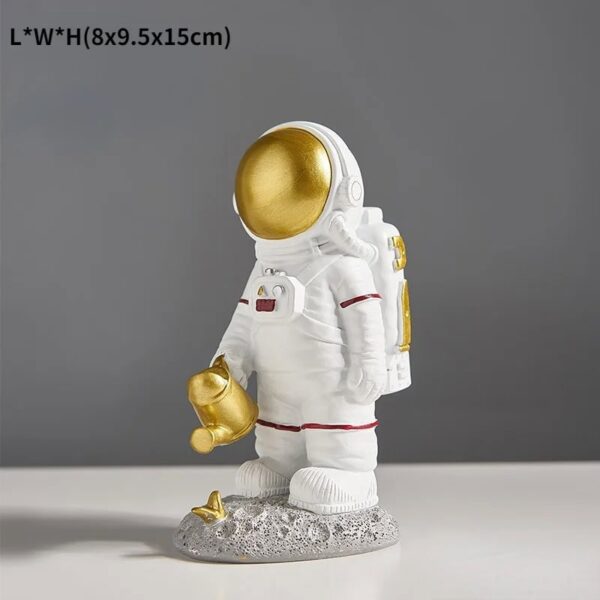 Astronaut Figurine with Gold Helmet and Tools.
