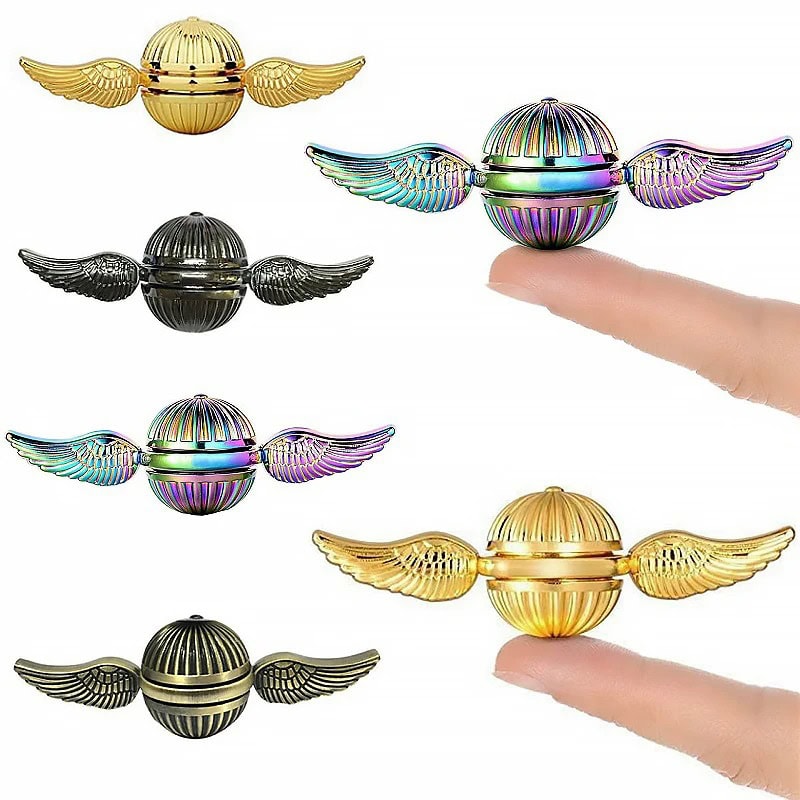 Golden Winged Orb Toy for Science & Decor Shiny golden winged orb toy with metallic wings, perfect for science decor and educational play, shown held between fingers for size reference.