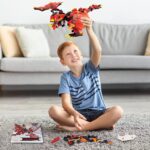 LEGO dragon building set for kids, featuring a detailed red and black dragon model with wings and tail.