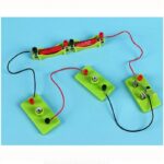 High school science experiment with electrical circuits on a blue background.