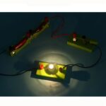 Educational science circuit with light bulb and wires for kids, 200 characters max.