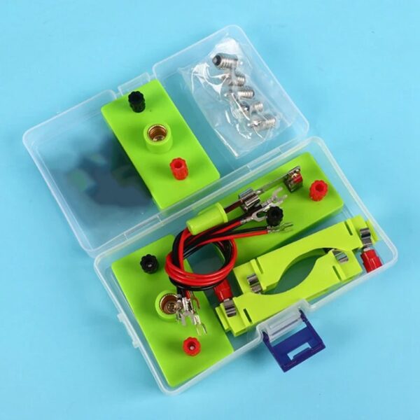 Electronics experiment kit with wires, batteries, and connectors for educational science projects.