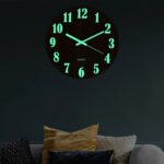 Luminous wall clock with glowing numbers and hands, perfect for bedrooms, living rooms, or classrooms, combining modern design with educational fun.